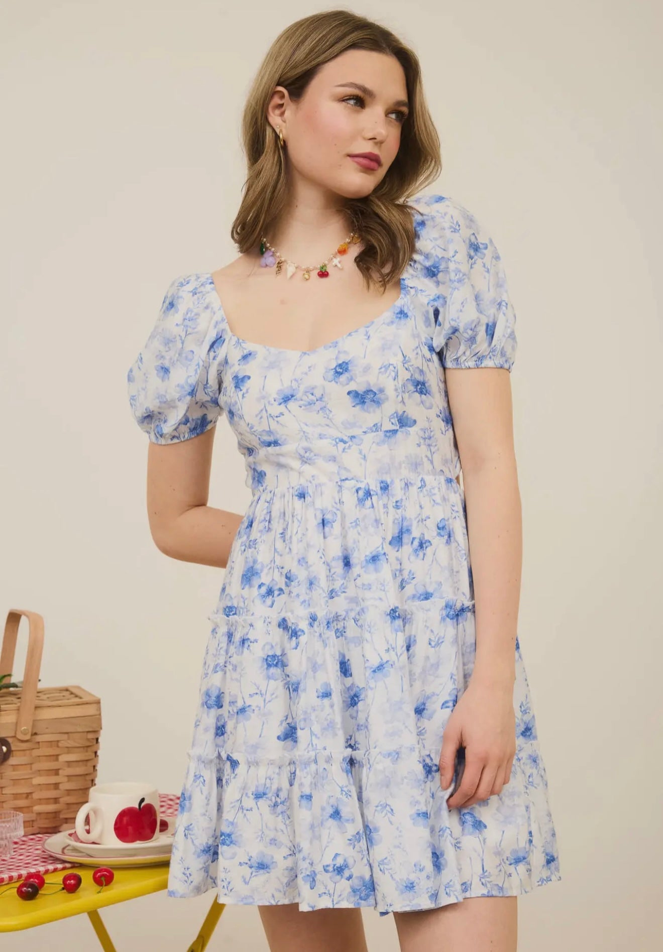 Blue Floral Open Back with Tie Tiered
Mini Dress