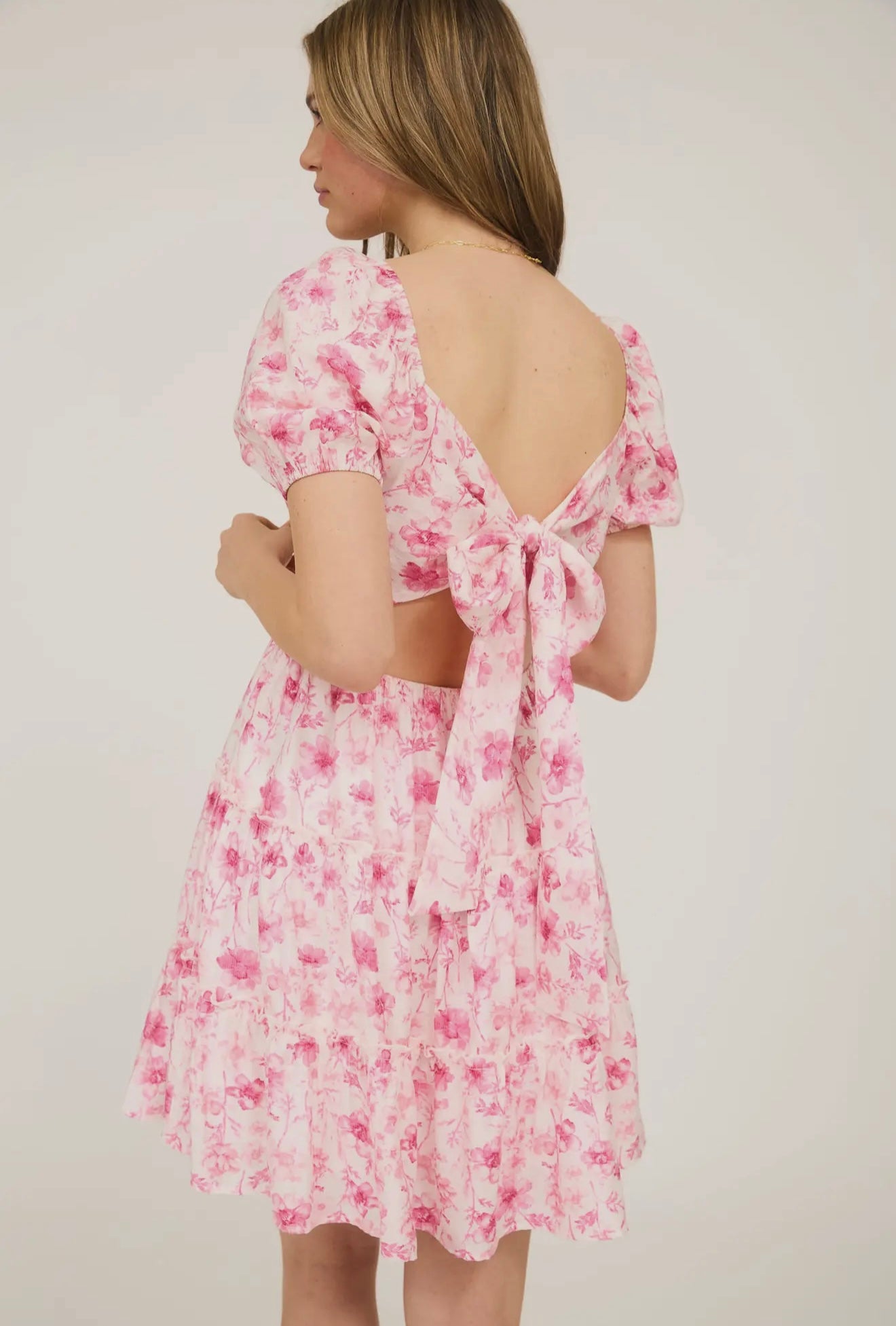 Pink Floral Open Back with Tie Tiered
Mini Dress
