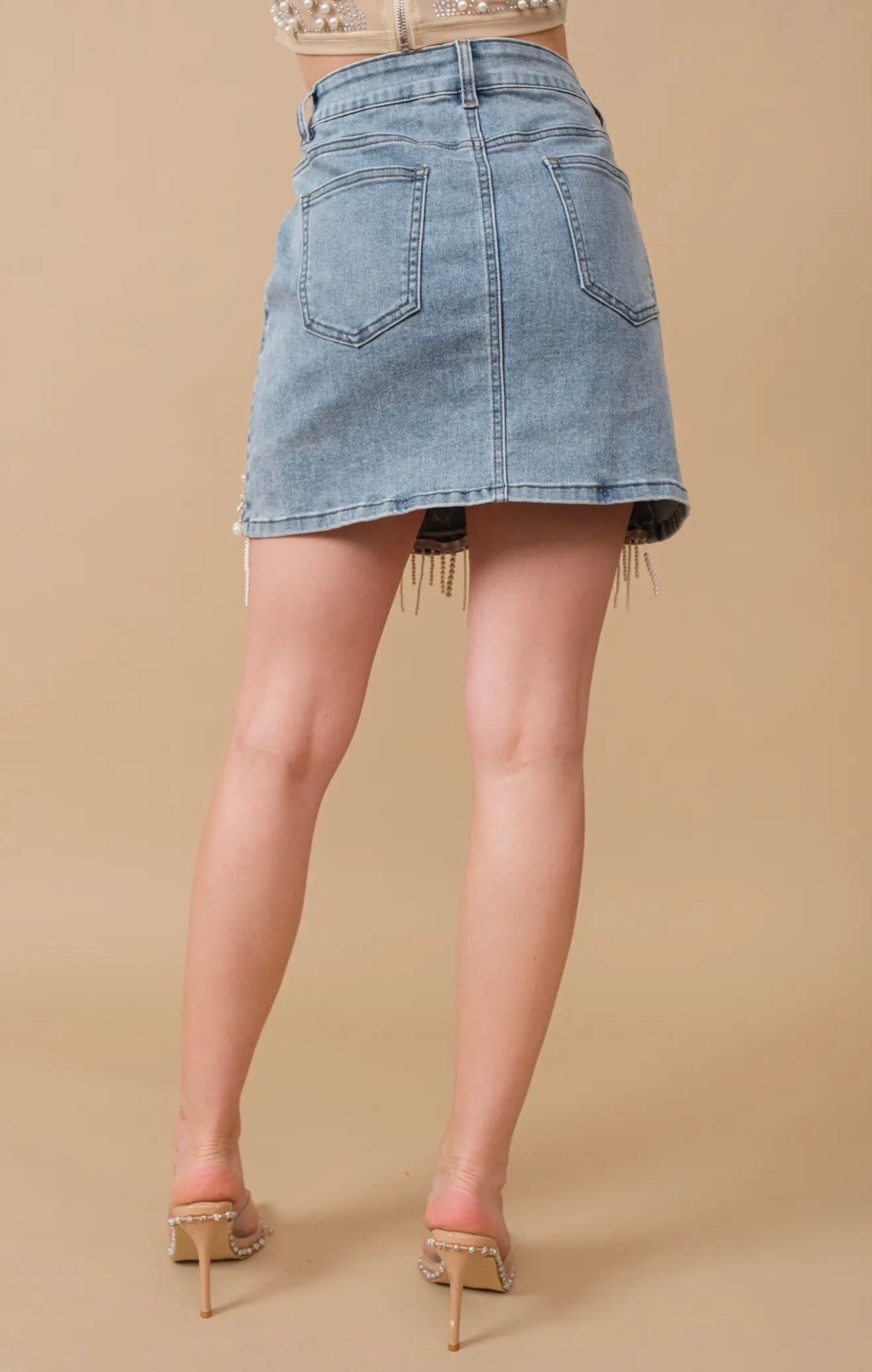 Stretch Denim Embellished Pearl
Fringe Mini Skirt