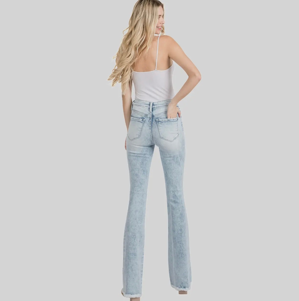 Petra153 Distressed Mid Rise Stretch
Flare Jeans