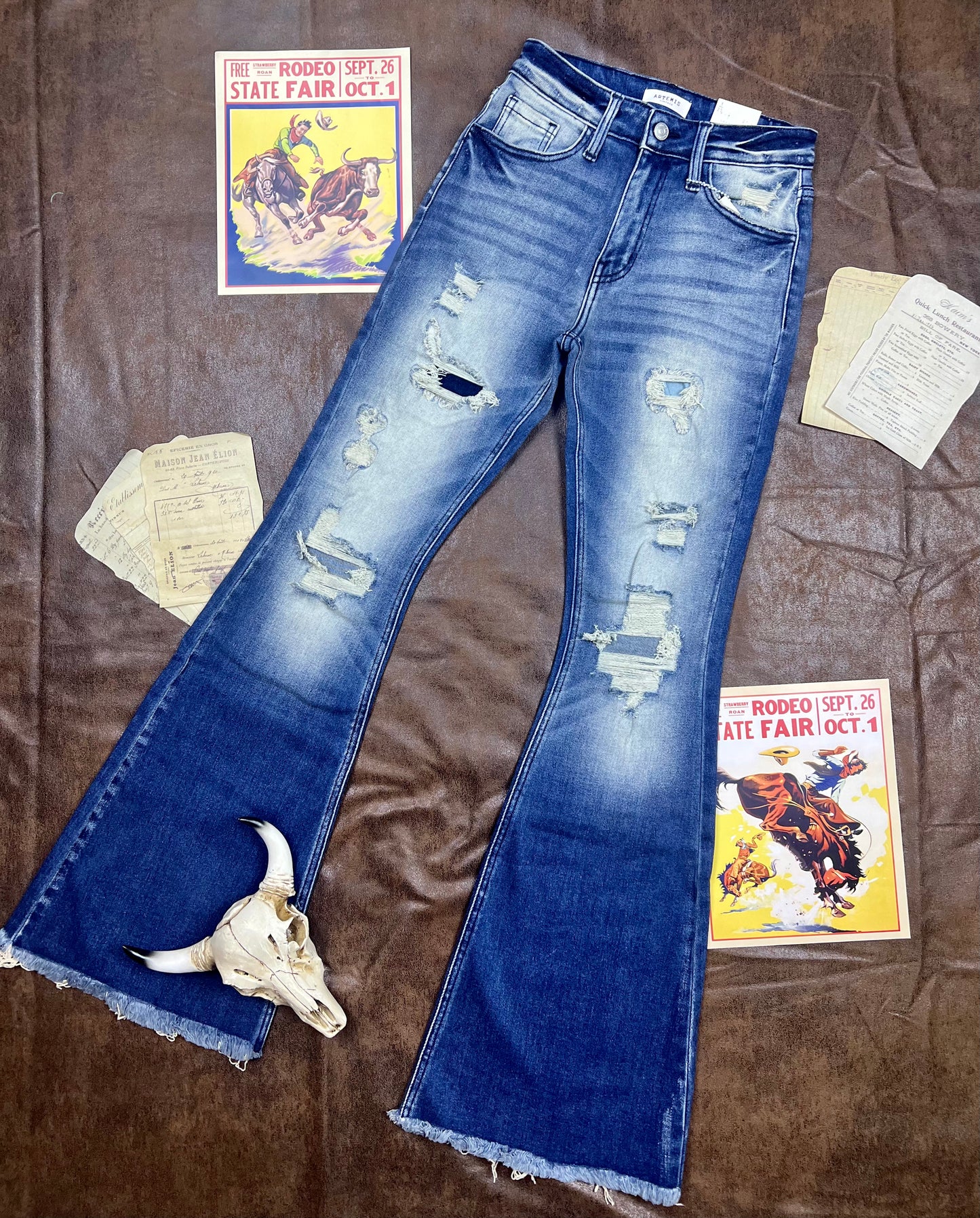 Artemis Vintage High Rise Stretch Super Flare Distressed Jeans